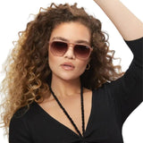 Quay Unisex On The Fly Retro Square Aviator Sunglasses in Oat Frame/Brown Lens-model